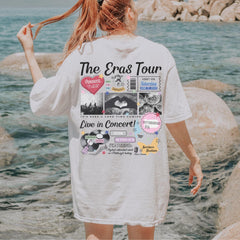 a woman standing on a rock next to the ocean