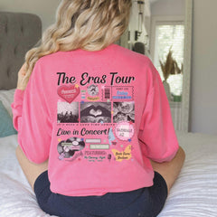 a woman sitting on a bed wearing a pink shirt