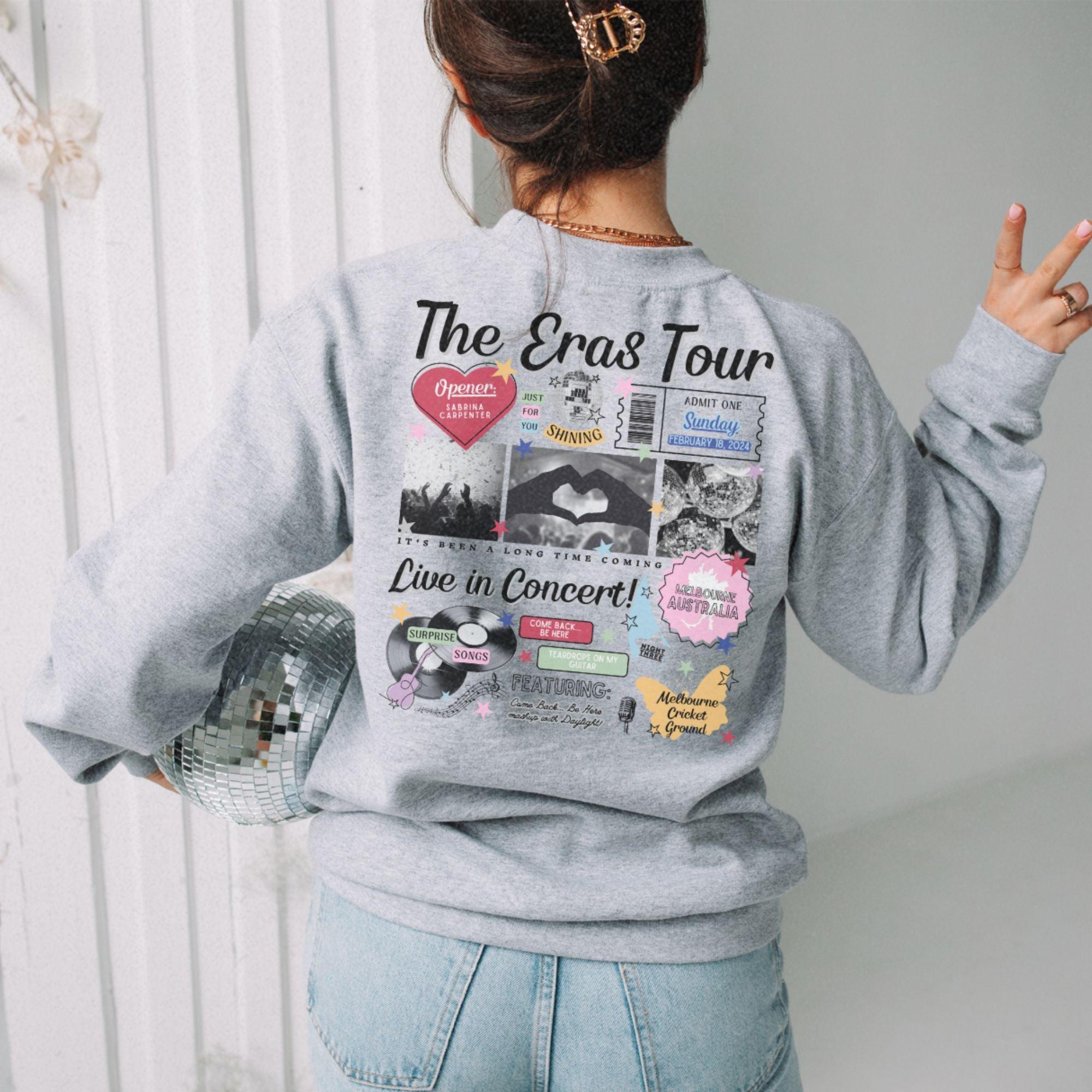 a woman wearing a sweatshirt with the words the eros tour on it