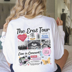 a woman sitting on a bed with her back to the camera