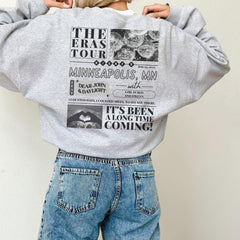 a woman wearing a sweatshirt with the words the terras tour on it
