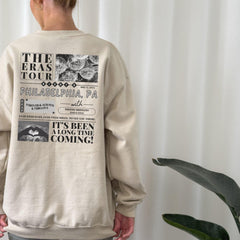 a man standing in front of a white curtain