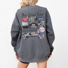 a woman wearing a gray sweatshirt with the words the end is tour on it