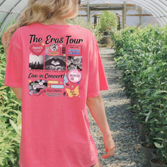 a woman in a pink shirt is walking through a greenhouse
