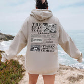 a person standing on a beach looking at the ocean