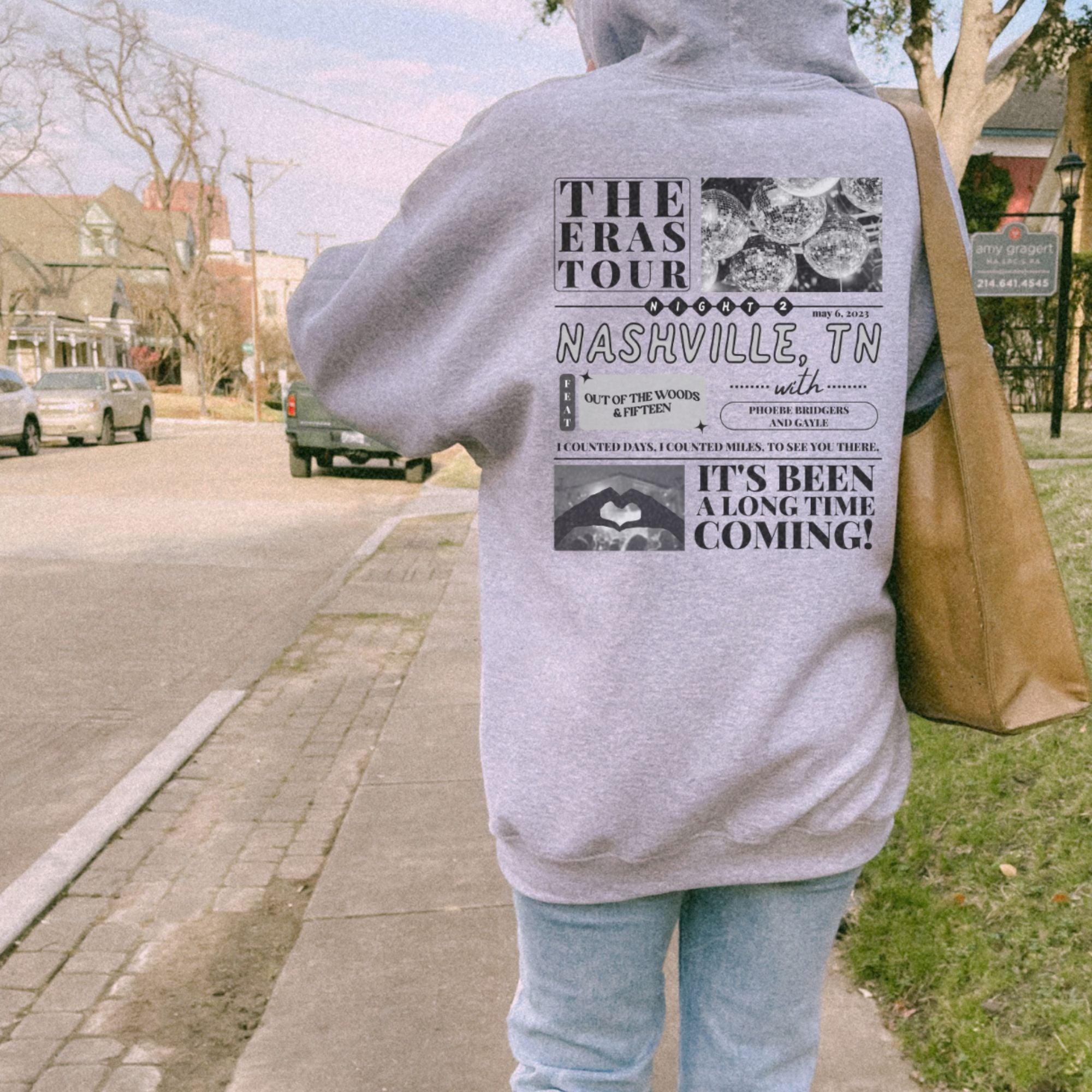 a person walking down a sidewalk with a bag on their back