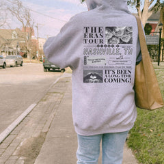 a person walking down a sidewalk with a bag on their back