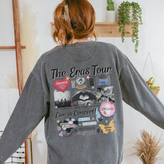 a woman wearing a gray sweatshirt with the words the gras tour on it