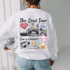 a woman wearing a white sweatshirt with the words the eras tour on it