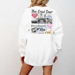 a woman wearing a white sweatshirt with pictures on it