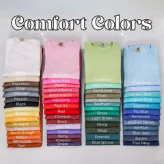 a collection of colorful t-shirts arranged in two rows, with each row containing a variety of different colored t-shirts.