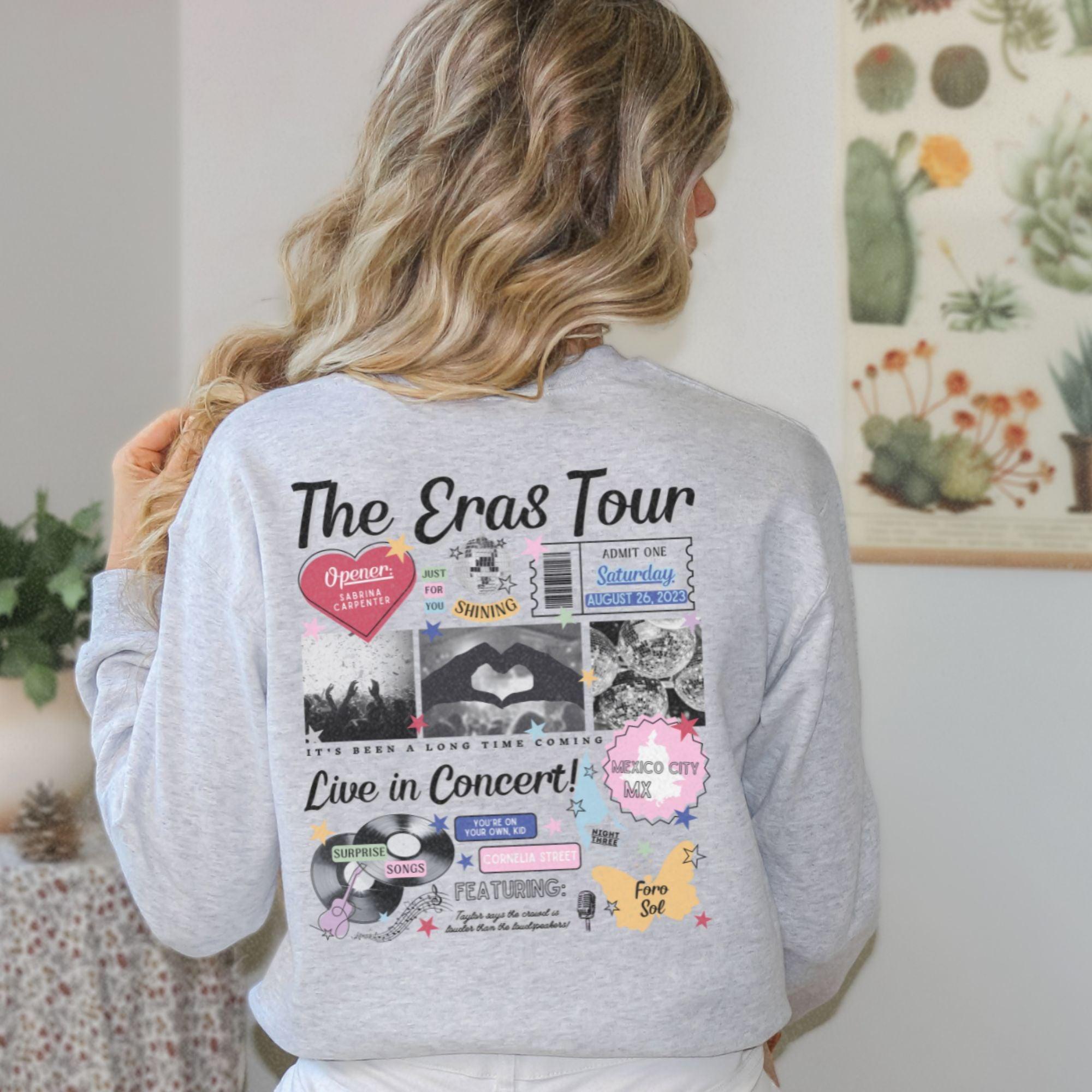 a woman wearing a sweatshirt with the words the circus tour on it