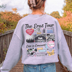 a woman with her back to the camera wearing a sweatshirt with the words the eras
