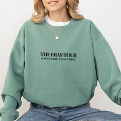 a woman wearing a green sweatshirt with the words, the overstoryr it was