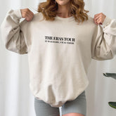 a woman wearing a sweatshirt and shorts