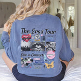 a woman sitting on top of a bed wearing a blue sweatshirt