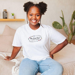 a woman sitting on a bed smiling for the camera