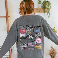 a woman wearing a gray sweatshirt with the words the gras tour on it