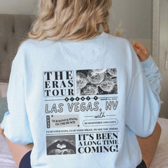 a woman wearing a t - shirt with a picture of las vegas on it