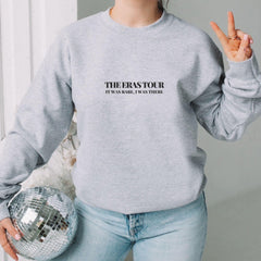 a woman holding a disco ball and making the peace sign