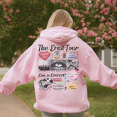 a woman wearing a pink hoodie with pictures on it
