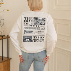 a woman standing in a room with her hands on her hips