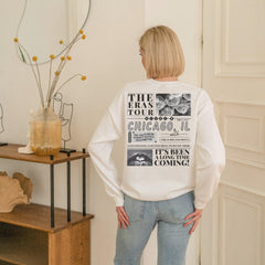 a woman standing in a room with her hands on her hips