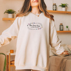 a woman standing in a room with her hands on her hips