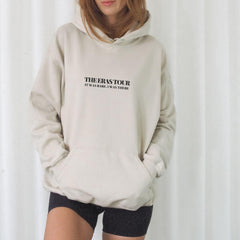 a woman wearing a white hoodie with the words the rest for it on it