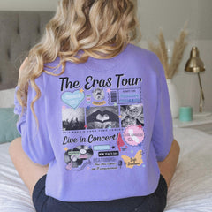 a woman sitting on a bed wearing a purple shirt