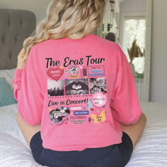 a woman sitting on a bed wearing a pink shirt