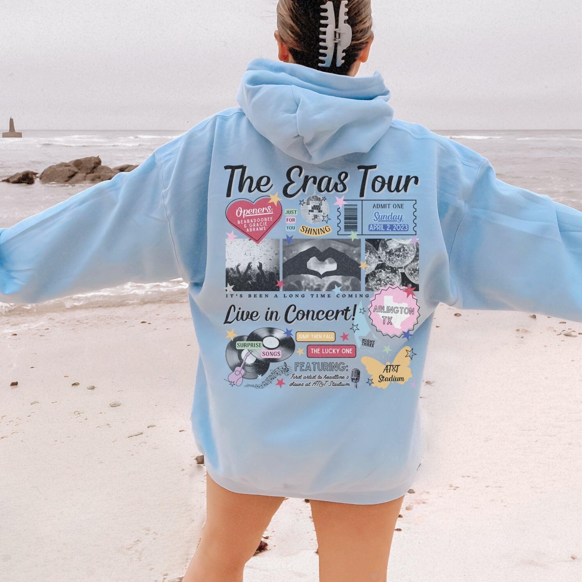 the back of a person wearing a blue hoodie