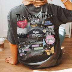 a woman sitting on the floor with her back to the camera