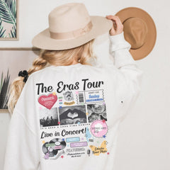 a woman wearing a white sweatshirt and a hat