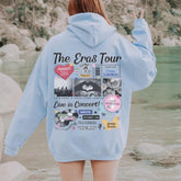 a woman wearing a blue hoodie with the words the end's tour written