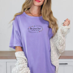 a woman wearing a purple shirt and white gloves