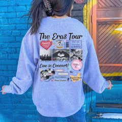 a woman standing in front of a blue brick wall