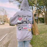 a person walking down a sidewalk with a bag