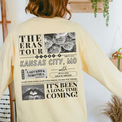 a woman wearing a yellow long sleeve shirt