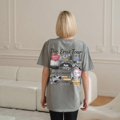 a woman standing in front of a white couch