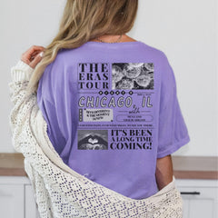 a woman wearing a purple chicago t - shirt