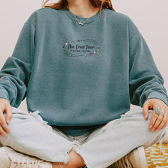 a woman sitting in a lotus position with her hands in her pockets