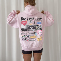 a woman wearing a pink hoodie with pictures on it