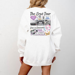 a woman wearing a white sweatshirt with pictures on it