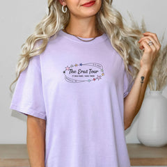 a woman with blonde hair wearing a purple shirt