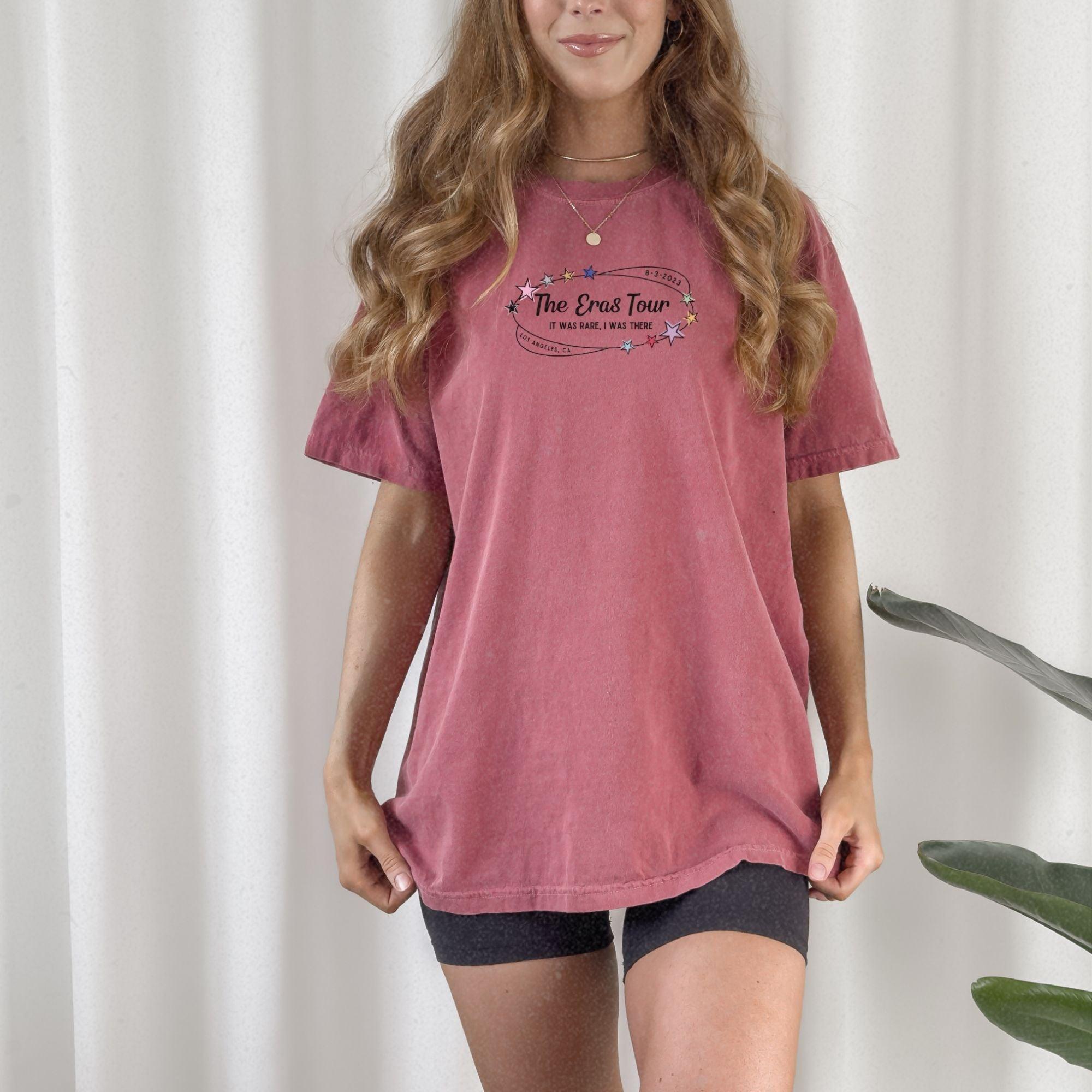 a woman standing in front of a white curtain