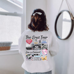 a woman standing in front of a mirror