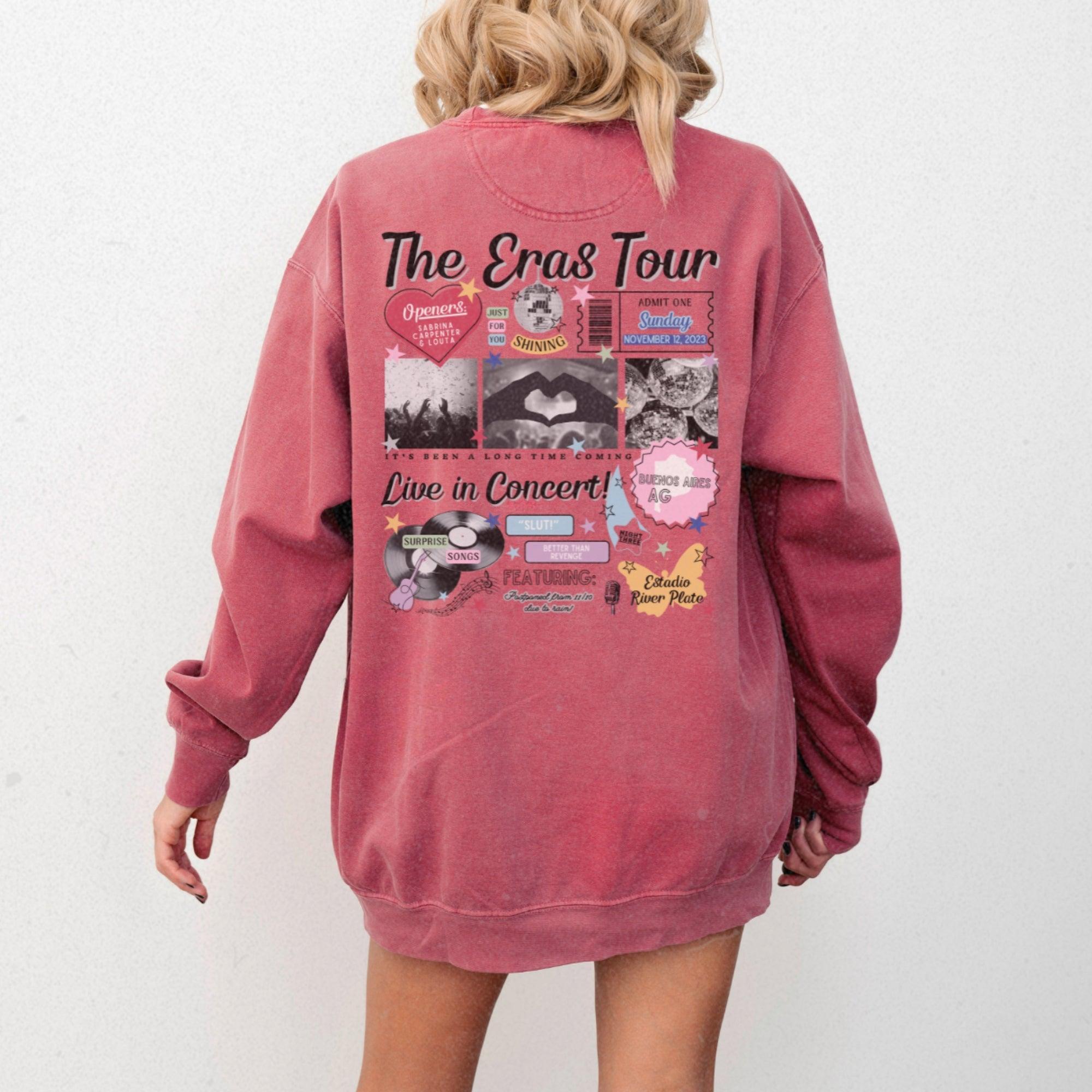 a woman wearing a pink sweatshirt dress with the words the cross tour printed on it