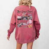 a woman wearing a pink sweatshirt dress with the words the cross tour printed on it