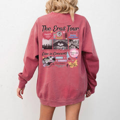 a woman wearing a pink sweatshirt dress with the words the cross tour printed on it